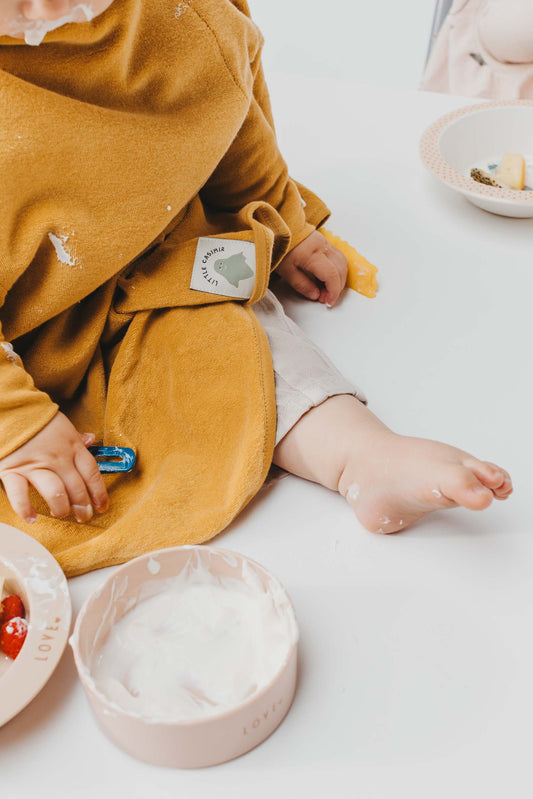 Lätzchen "Boo" aus Frottee, wasserdicht, Mustard | Little Casimir