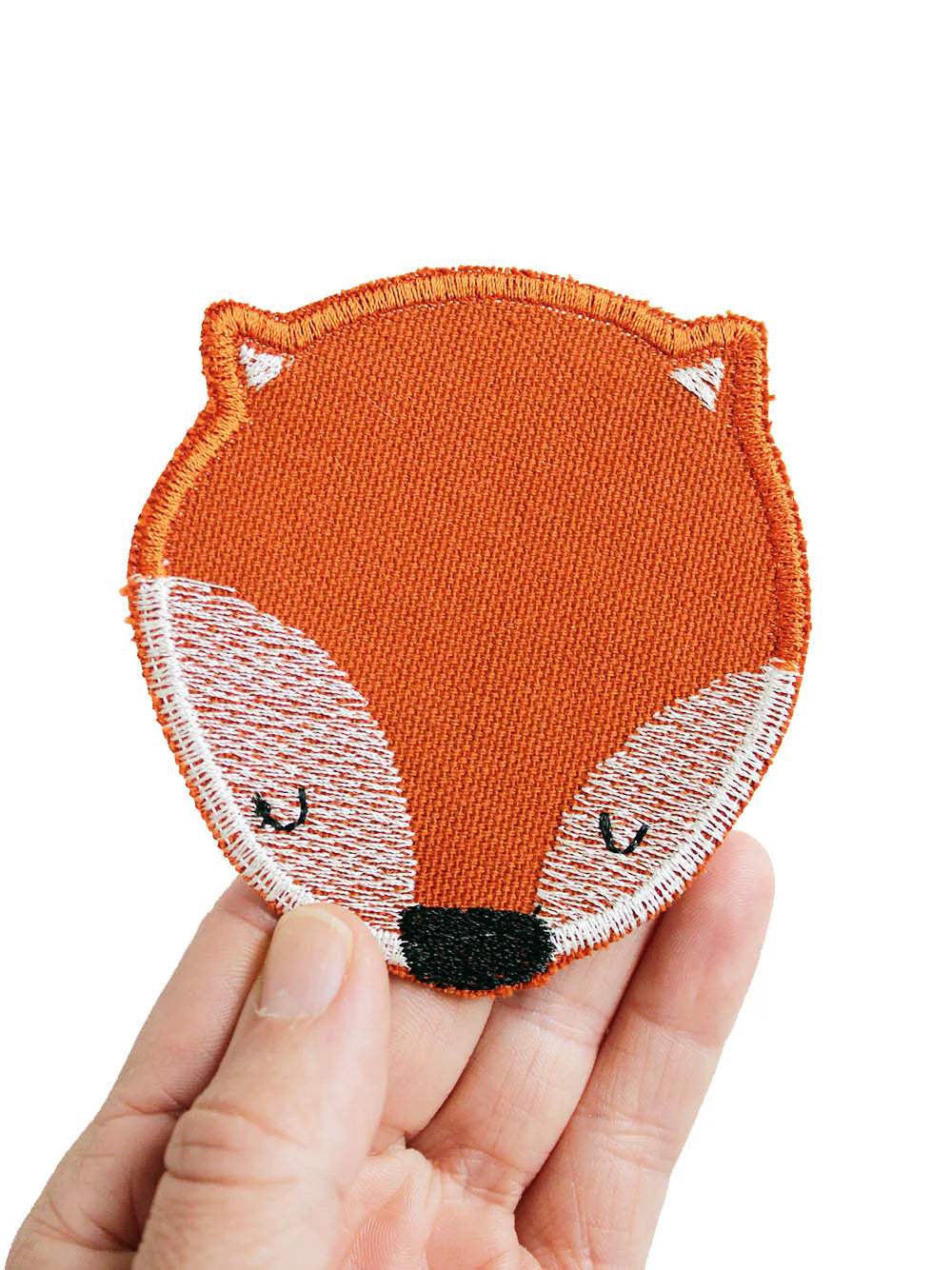 Knieflicken Fuchs groß, in der Hand