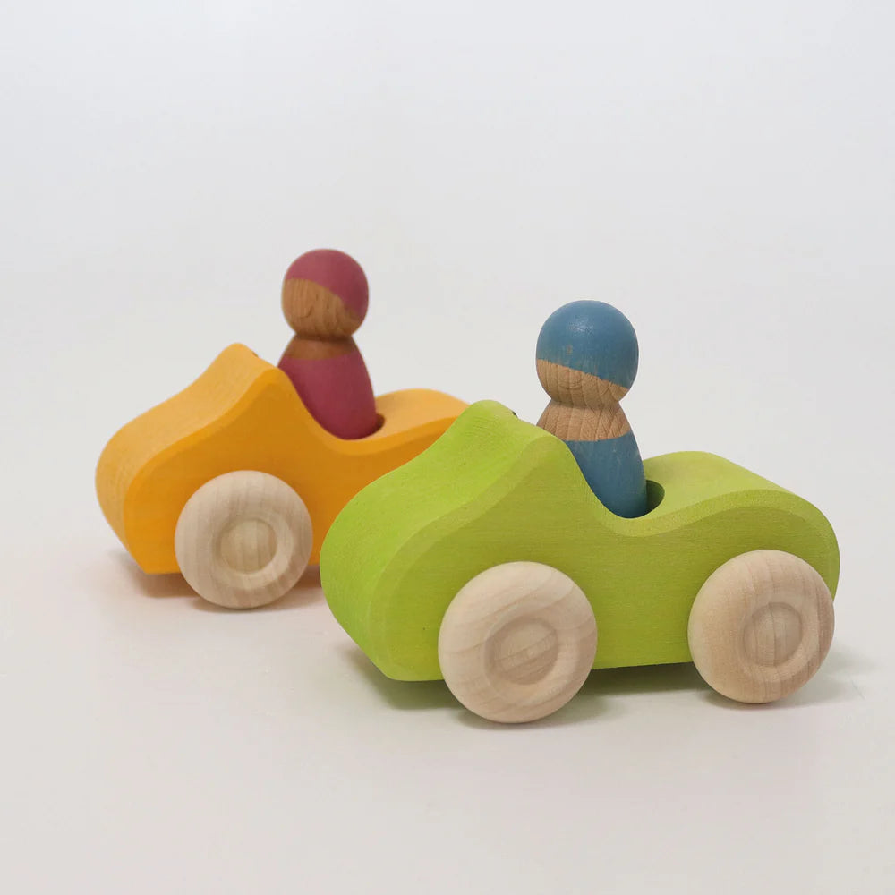 Kleines Cabrio mit Puppe. Grün | Grimms
